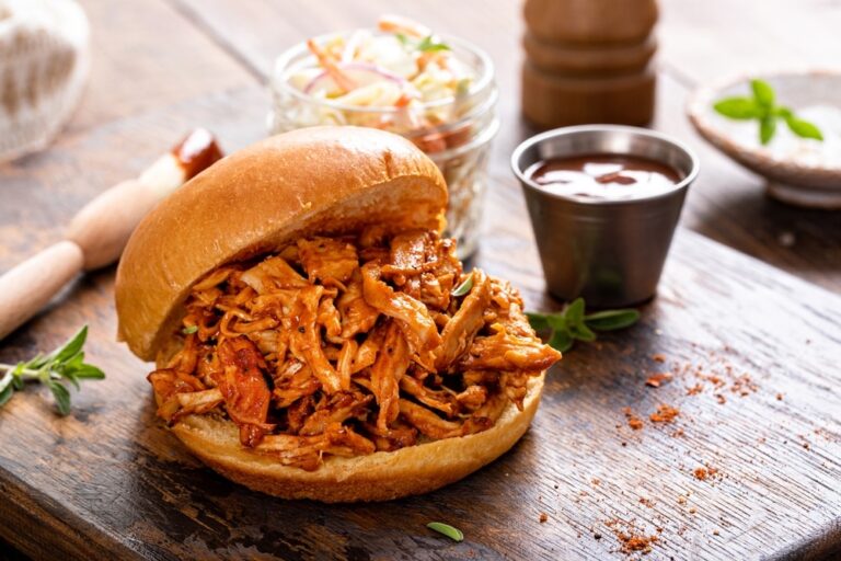 Pulled,Bbq,Chicken,Sandwich,On,A,Brioche,Bun,Served,With
